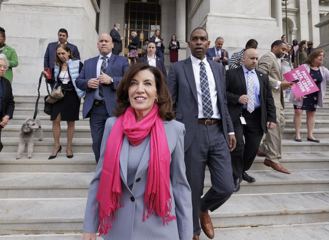 New York Gov. Kathy Hochul walks down the steps on the State Capitol at a rally calling for stronger abortion rights on May 3.